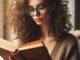 Person with glasses reading a book | guide to reads